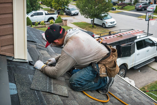 Professional Storm Damage Roof Repair technician working in Newton Lower Falls, MA